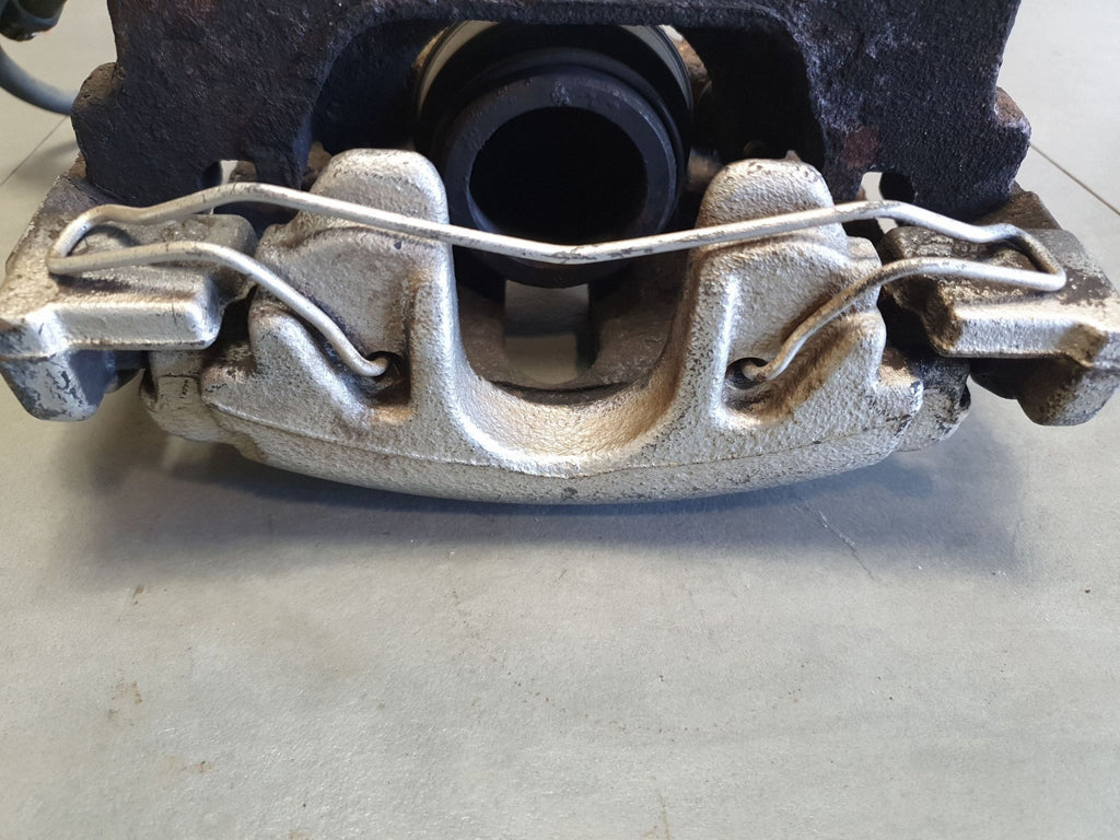 Volkswagen PASSAT CC Brake caliper left front yoke 1K0615123E